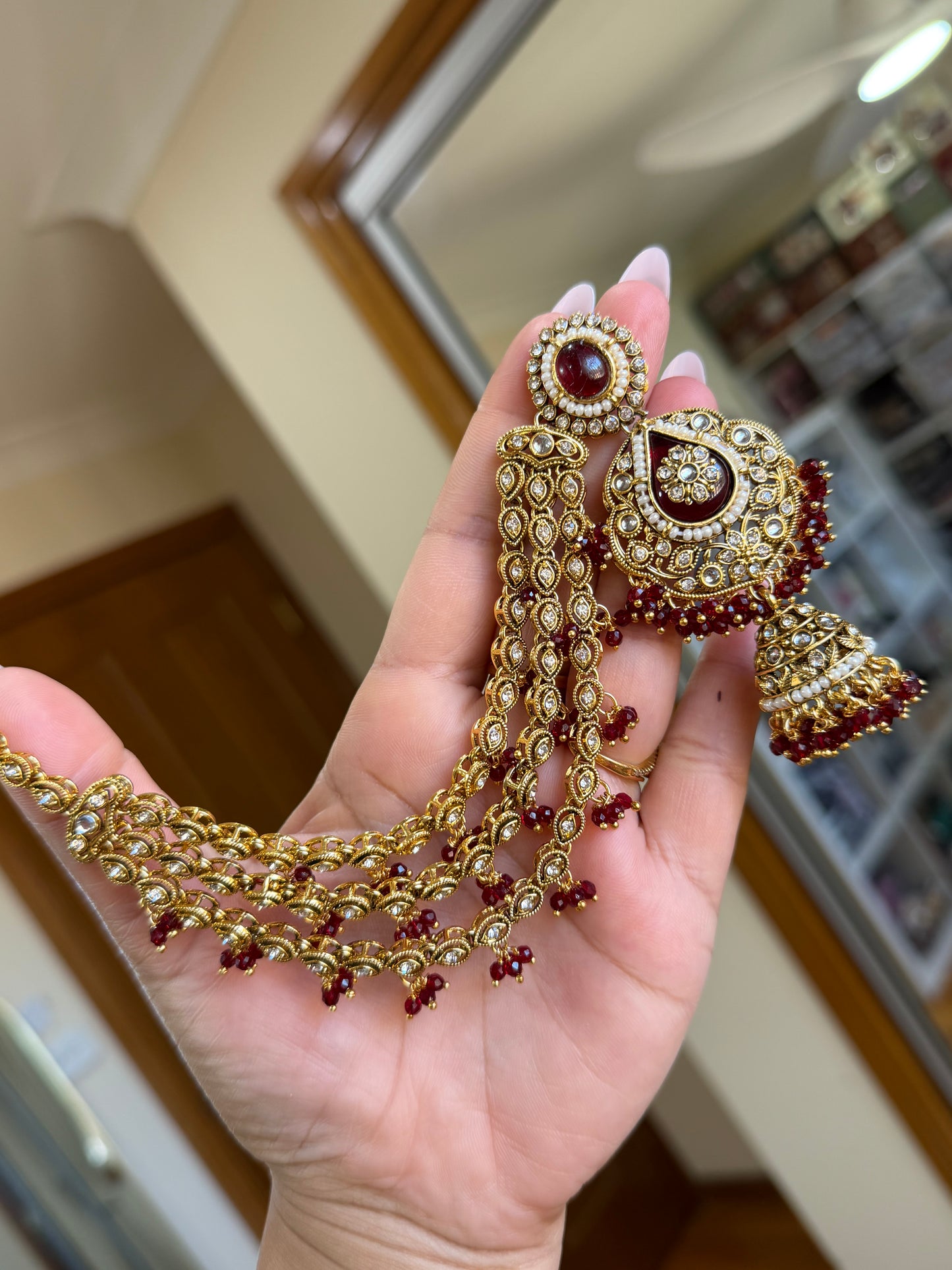 Kundan earrings with attached sehare