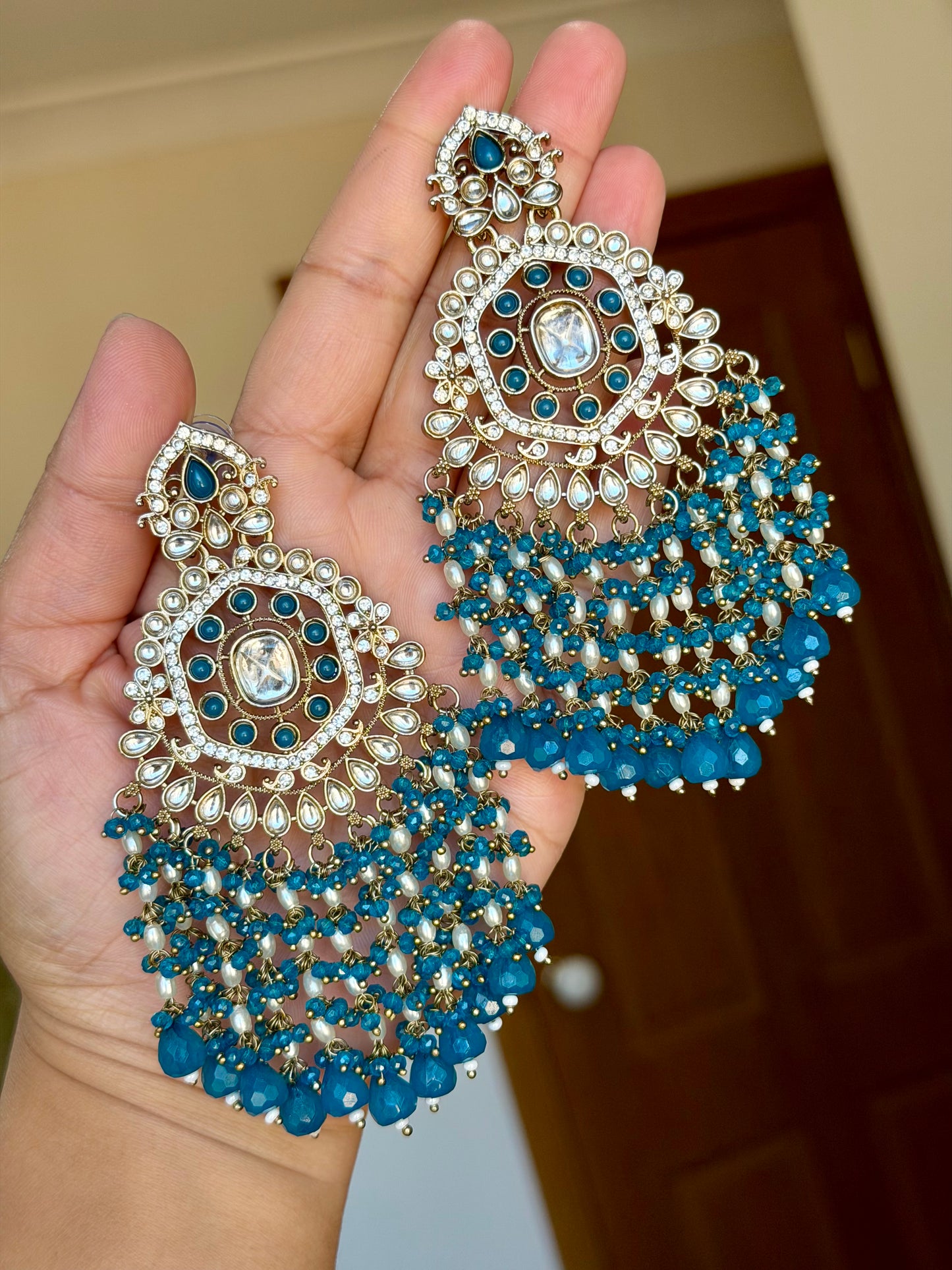 Oversized kundan earrings