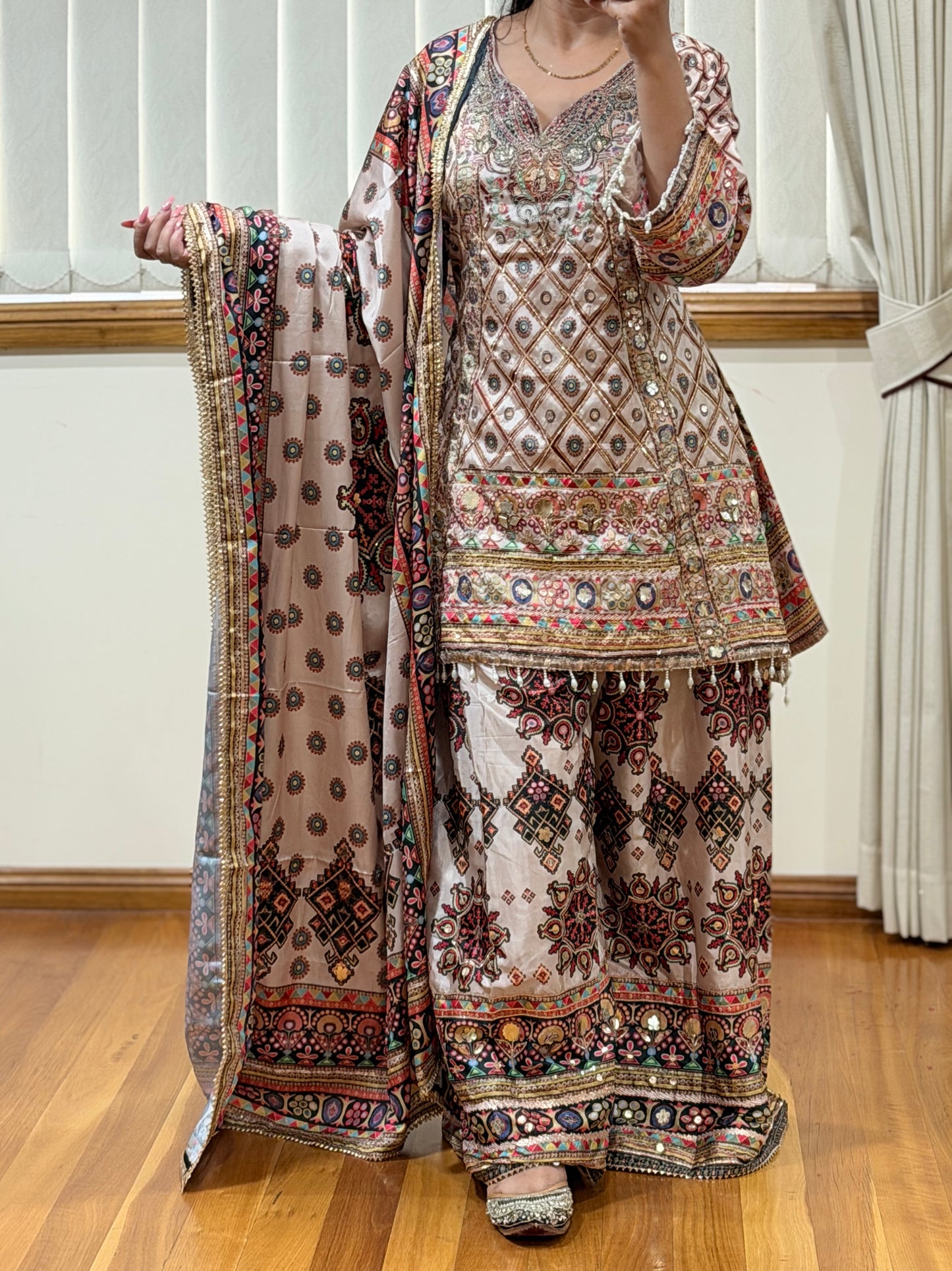 Elegant Sharara Suit with Intricate Aari & Gota Detailing