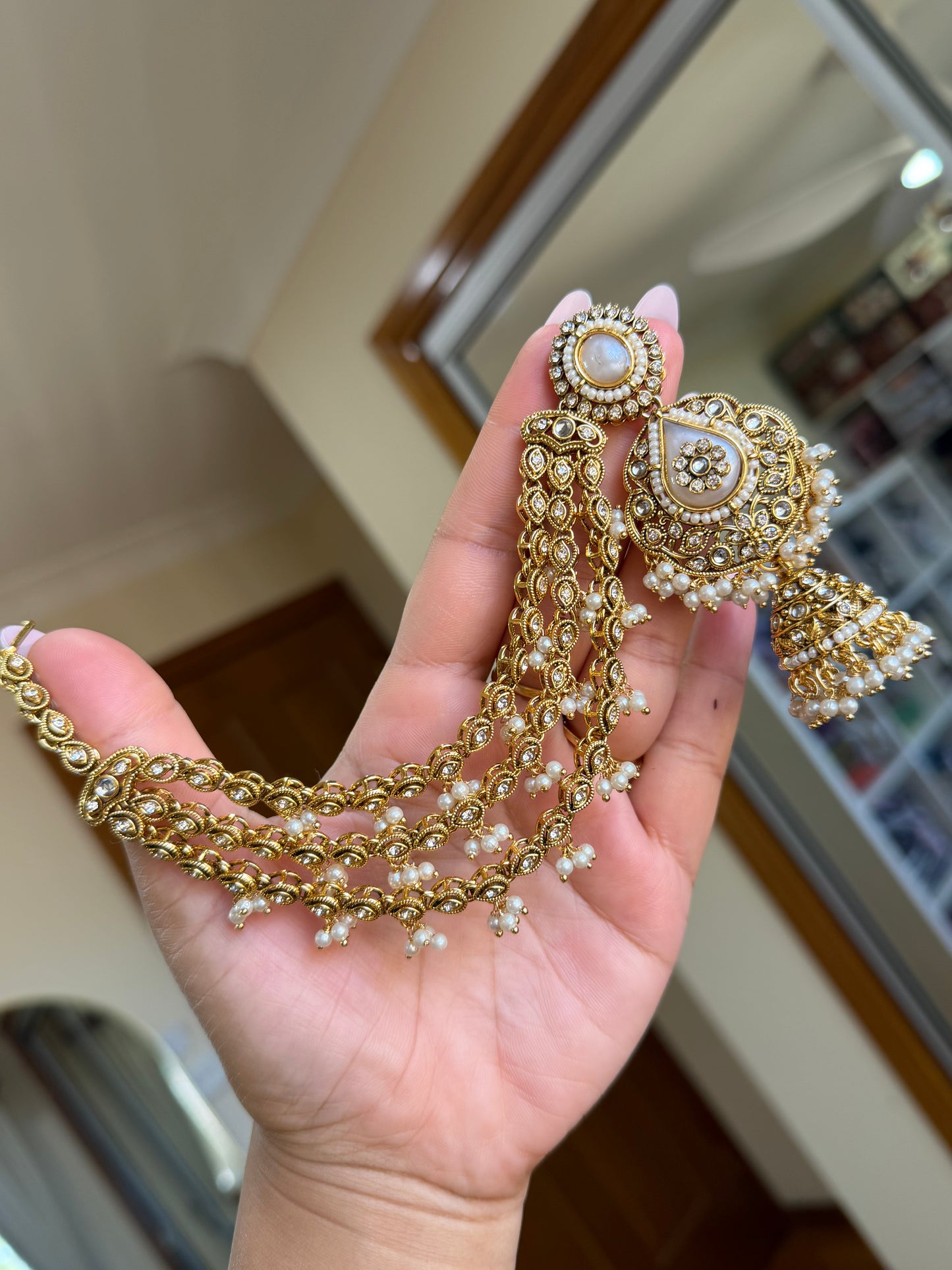 Kundan earrings with attached sehare