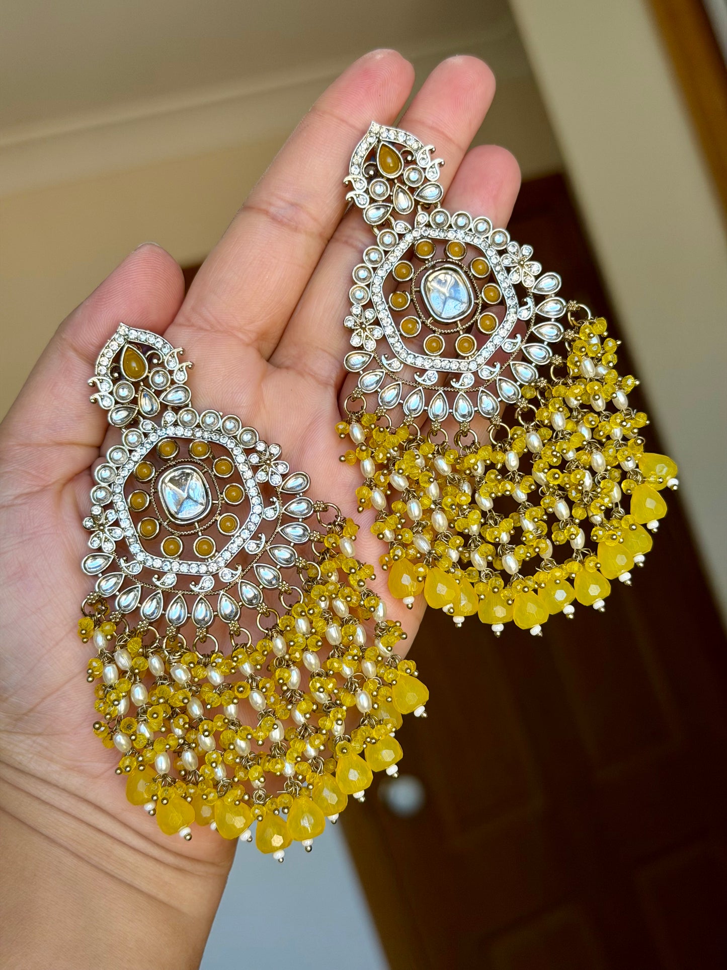 Oversized kundan earrings