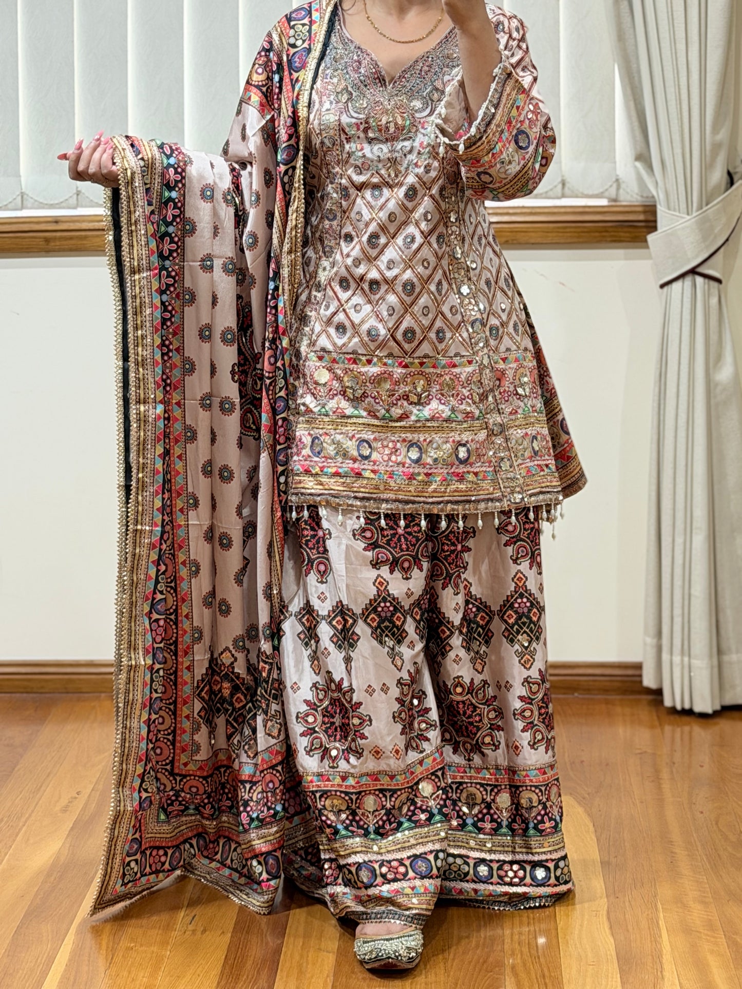 Elegant Sharara Suit with Intricate Aari & Gota Detailing