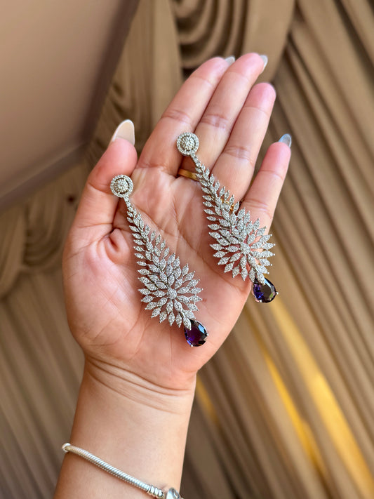 Premium ad earrings purple