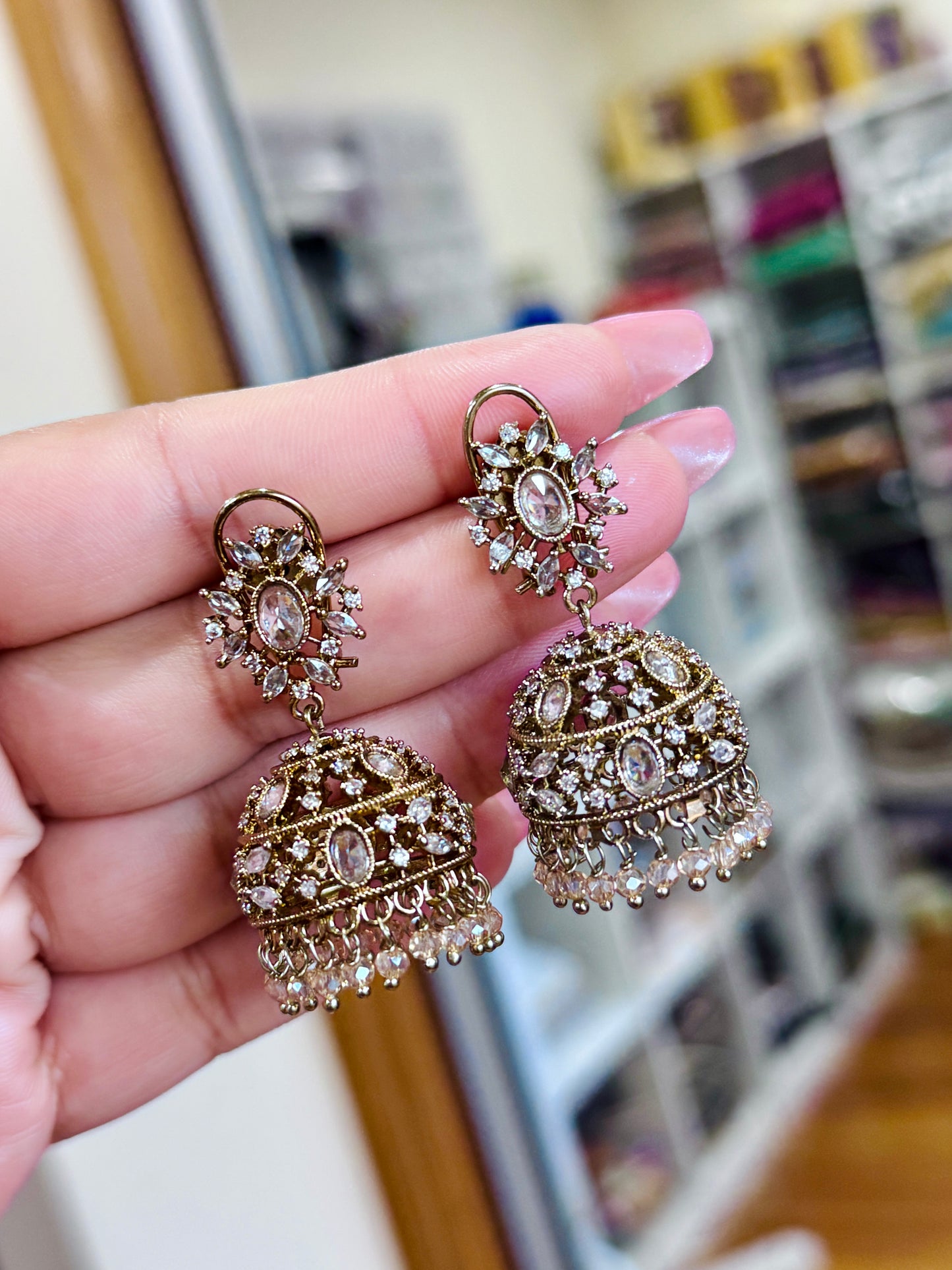 Ad jhumki with small Crystal beads
